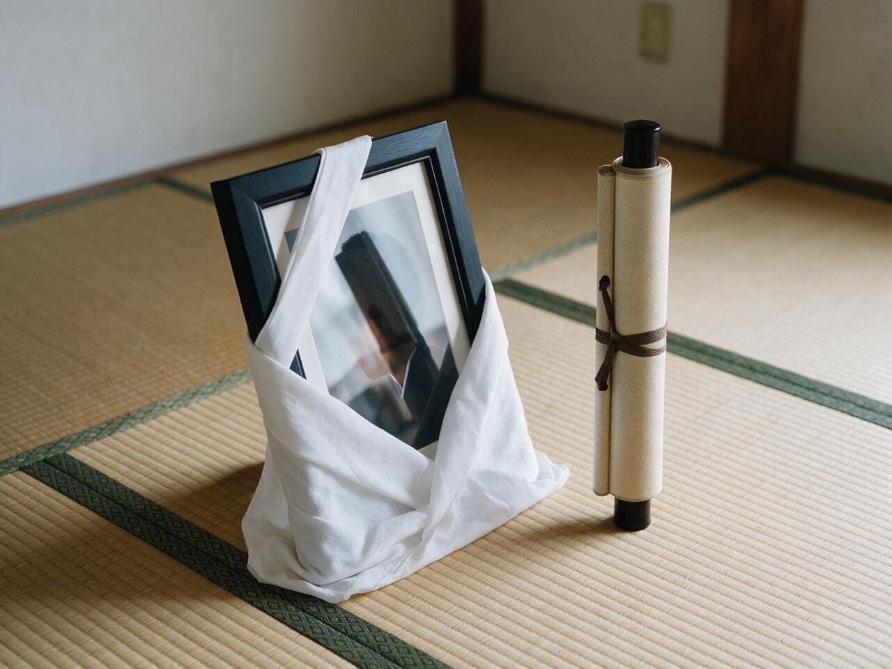 お焚き上げするご遺影と掛け軸